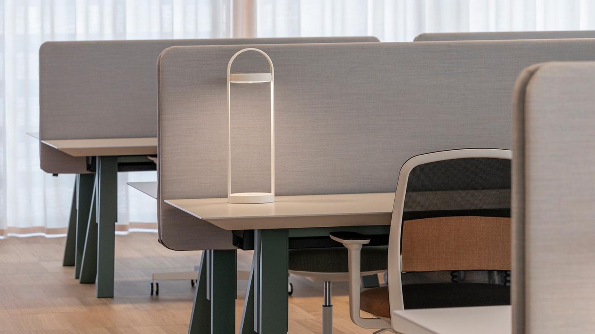 pedrali-office-lamp. Pedrali desk lamp in a contemporary office workspace.